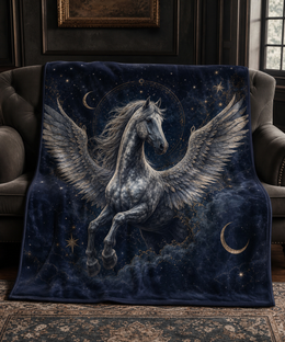 Custom winged horse 50 by 60 inch velveteen blanket on a sofa