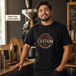 Small business owner wearing a black custom printed heavy cotton T-shirt